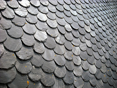 Natural slate roofing by Vicburton on Flickr.